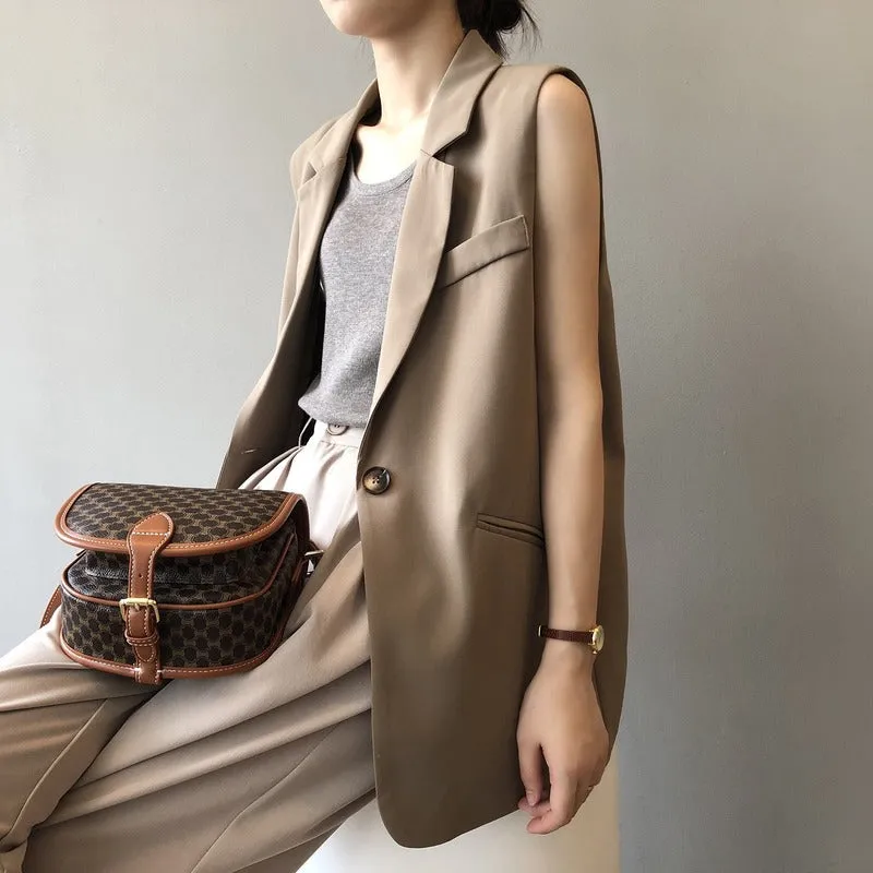 Women's Modern Brown Sleeveless Blazer with Pockets and Button | Ideal for All Seasons